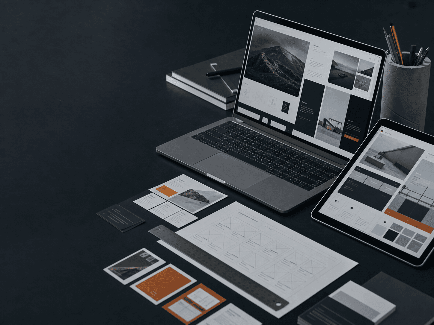 Digital architects shaping responsive interfaces, system diagrams and AI workflows around a studio table